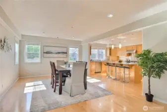 Open concept dining and kitchen with bar space to visit with the cook!