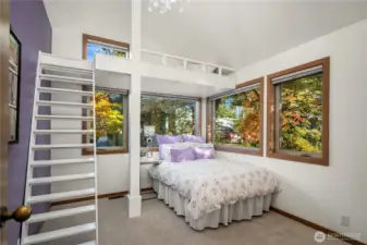 Third upstairs bedroom. Many windows bring in the light.