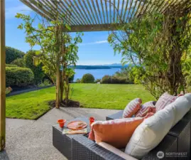 Wonderful rear patio with view is super private and sunny.