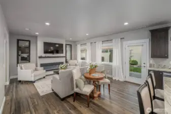LIving area with fireplace and tea table