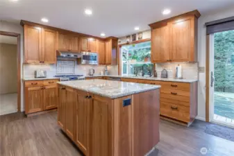 Custom cherry cabinets with under-cabinet lighting