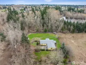 Your own shy acre tucked away with privacy, but still close to freeways, shopping and more!