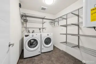 Huge laundry room with tons of Elfa storage