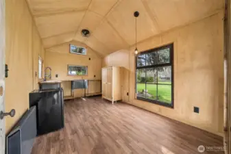 Inside the outbuilding. Has power, water & charm.