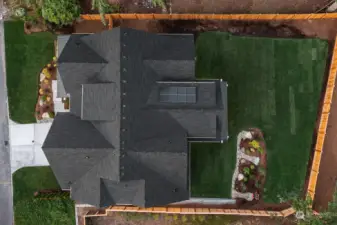 This home contains solar panels. The photo above is from a different MN Custom Home with a similar solar array.