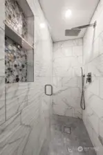 Primary shower updtd: extended/new tiling+niche/glass door