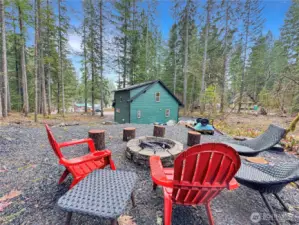 Custom fire pit overlooking the back of the house.
