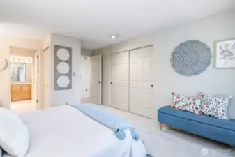 Primary bedroom features plenty of closet space, and brand new carpet.