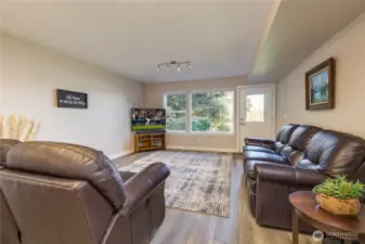 Family room on the lower level. Radiant heating keeps this level warm and dry year-round.