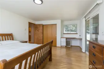 Built-in desk and large closet in the primary bedroom