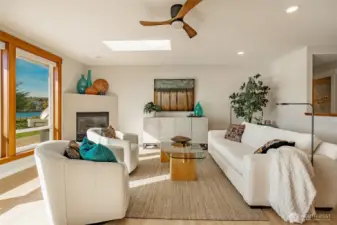 Refaced fireplace with large format Italian tile & cellular top/down shades w/remote