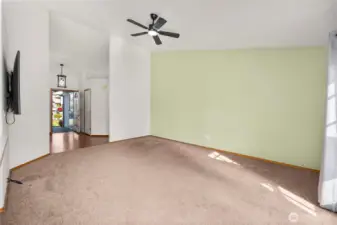 Vaulted ceilings and new ceiling fan right off the kitchen.