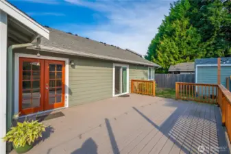 Huge trex deck for easy maintenance. Door leading from the family room and primary bedroom
