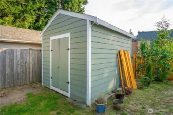 Shed was built on the lot and has plenty of room inside for yard tools, lawnmower, and anything else you want to store.