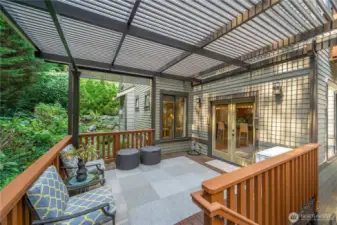 The louvre roof covering allows you to control sunlight and airflow, creating a versatile space for relaxation or entertaining
