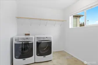 Upstairs laundry room makes everything so convenient!
