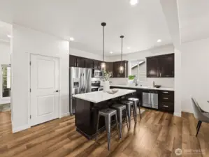 Eat-in counter height island with pantry.