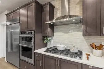 Chef's kitchen with 48" counter depth side by side refrigerator & gas cooktop - you will love cooking in this kitchen!