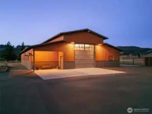 An easy stroll from your front door across smooth asphalt into your spectacular workshop.