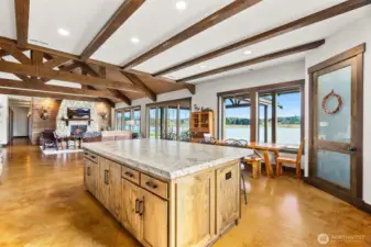 Massive prep space and eating bar. Ample walk in pantry storage