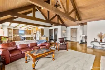 Massive open beam vaulted ceilings.  Open great room design. Ideal for entertaining.