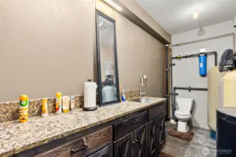 Bath and clean up area in the shop. "Even the shop has granite countertops!"