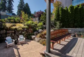 Lovely exterior seating areas at front entry offer morning sunshine and privacy from street. This home boasts several outdoor decks to enjoy our wonderful PNW temperatures and lifestyle of living out-of-doors throughout our warm months of the year.