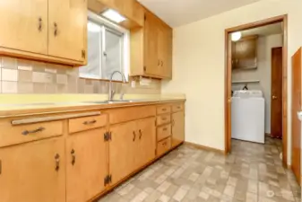 Kitchen complete with original cupboards.