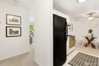 Entry/hallway shows the easy flow throughout this condo. Freshly painted as well as new carpet. The seller took care of some of things to make it move-in ready.