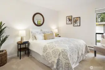 The bedroom feels bigger with nice window providing additional light into the room.