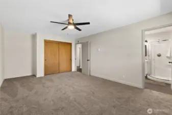 The primary suite is super spacious and has a fully renovated en suite bath