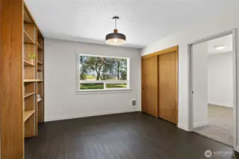 Dining area, with built in bookshelves, and a view to the north
