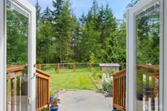 Come on out and enjoy the fenced back yard and patios