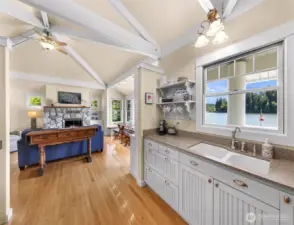 Storage throughout the kitchen, make great use of the open shelving!