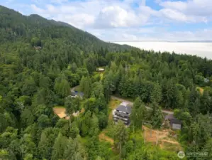 An aerial view of the land between the two homes.