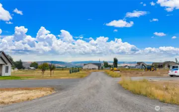 Nice country road leads up to the lot on the culdesac!