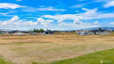 Nice level lot to make into whatever you want .... a home with a large yard or a place for a few animals!