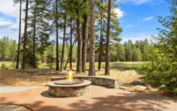 Gather under the stars and around the firepit overlooking the lake and golf course