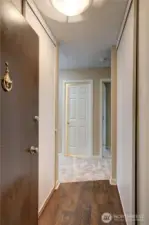 Condo entry w/ double door closets for storage