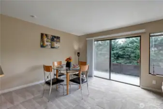 Dining area overlooking back deck- virtual stage