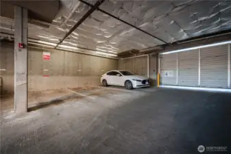 Space #49, just inside the garage door and across from door leading to unit