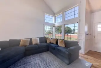 The great room with vaulted ceilings. Lots of sunlight with this southern exposure.