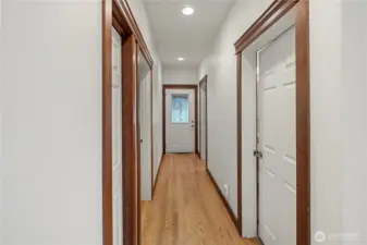 Downstairs hall will take you to plenty of storage, bedroom on the main, sunroom, mudroom and 3/4 bath.