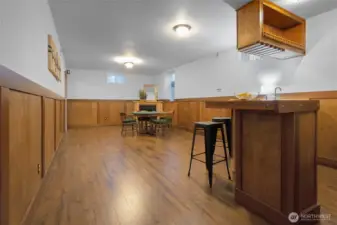 Downstairs Game room or extra family room with bar area and fireplace.