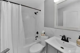BR 2's bath on lower level. . .