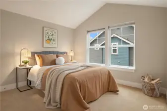 The 2nd bedroom on the top floor is also spacious with it's own private bath.