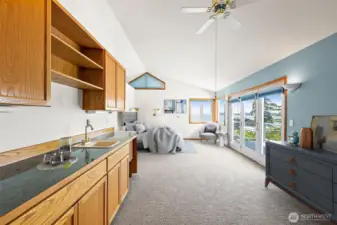 Primary Suite with Wet Bar & French Doors to the Balcony