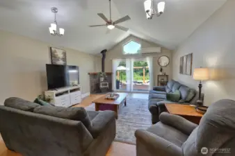 Living room has sliding door to back patio area.