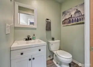 Updated powder room off the hallway.