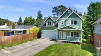 A large flat front yard. Plenty of parking in the driveway, garage, and extra street parking for guests.